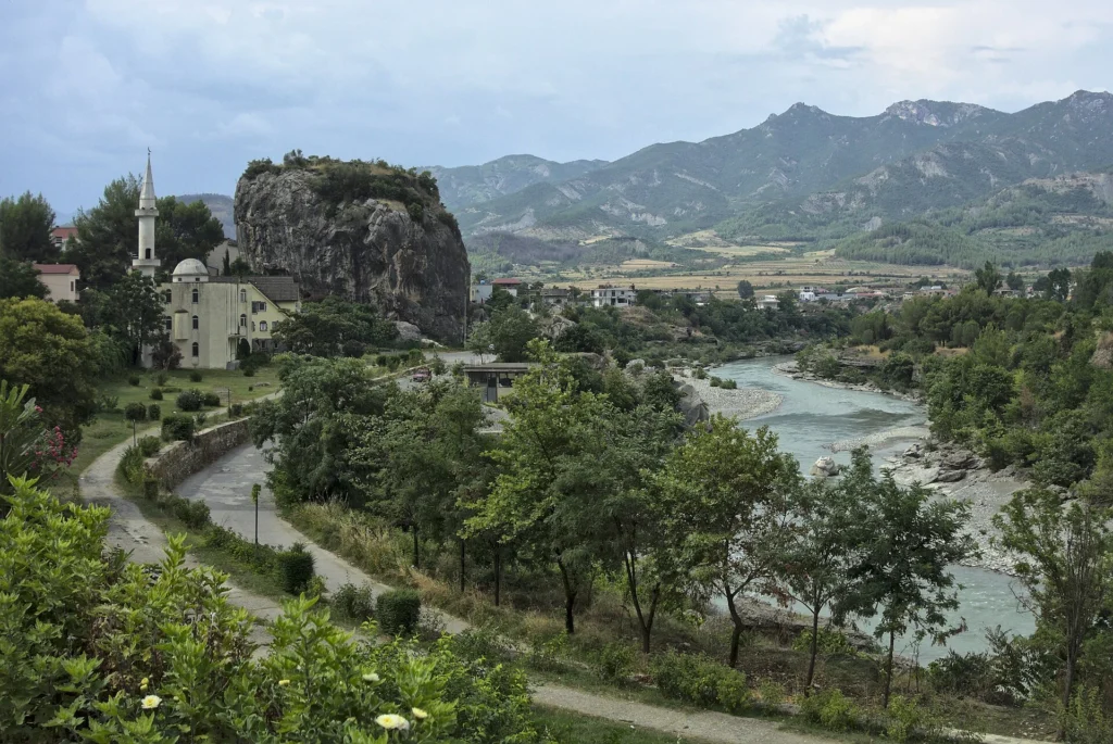 Përmet beside the Vjosa River with Gur i Qytetit rock
