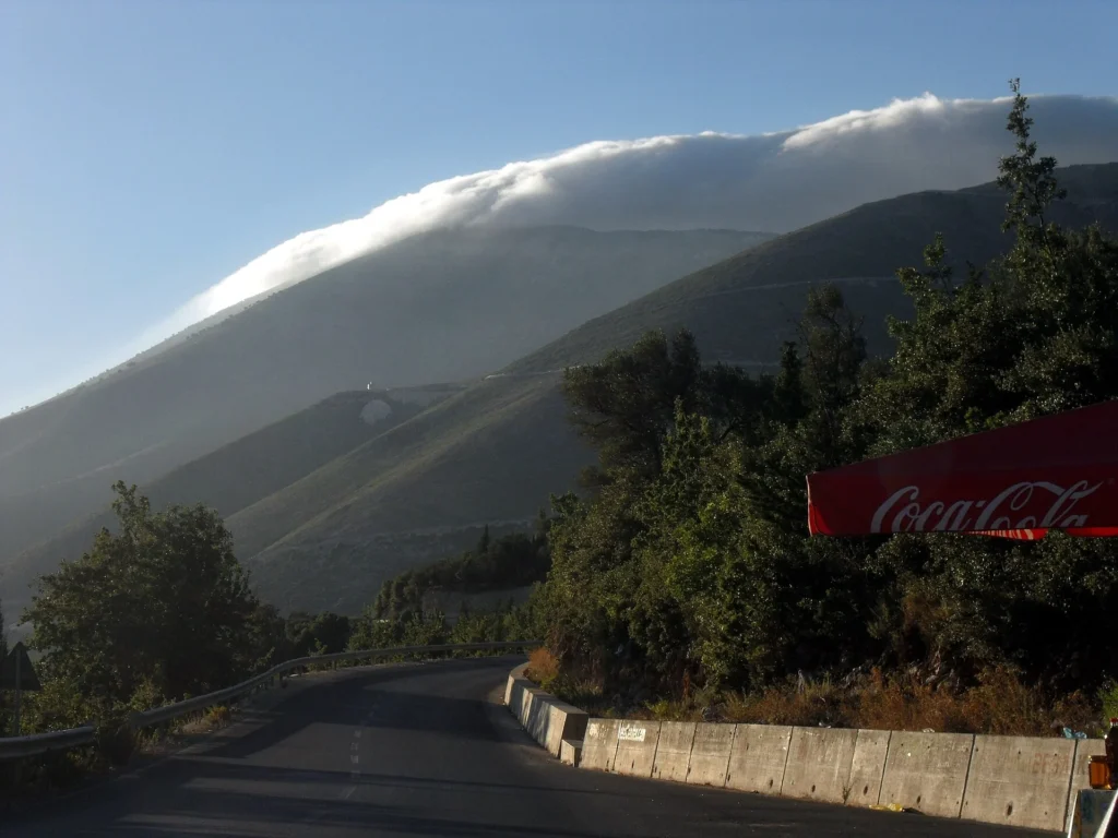 Scenic SH8 coastal road between Saranda and Vlora on an Albanian Riviera road trip